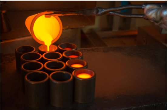 Purification of molten gold
