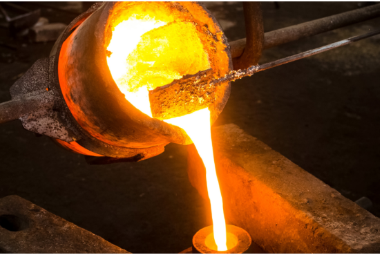 Pouring molten gold into moulds